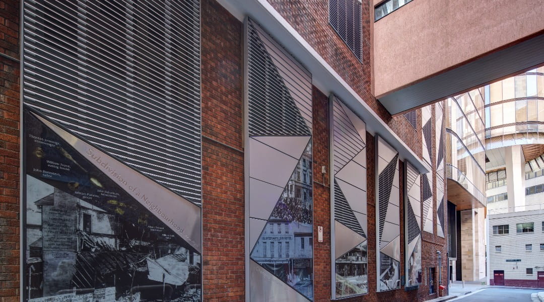 maps and images of the 200 George site history displayed along the Underwood Street laneway